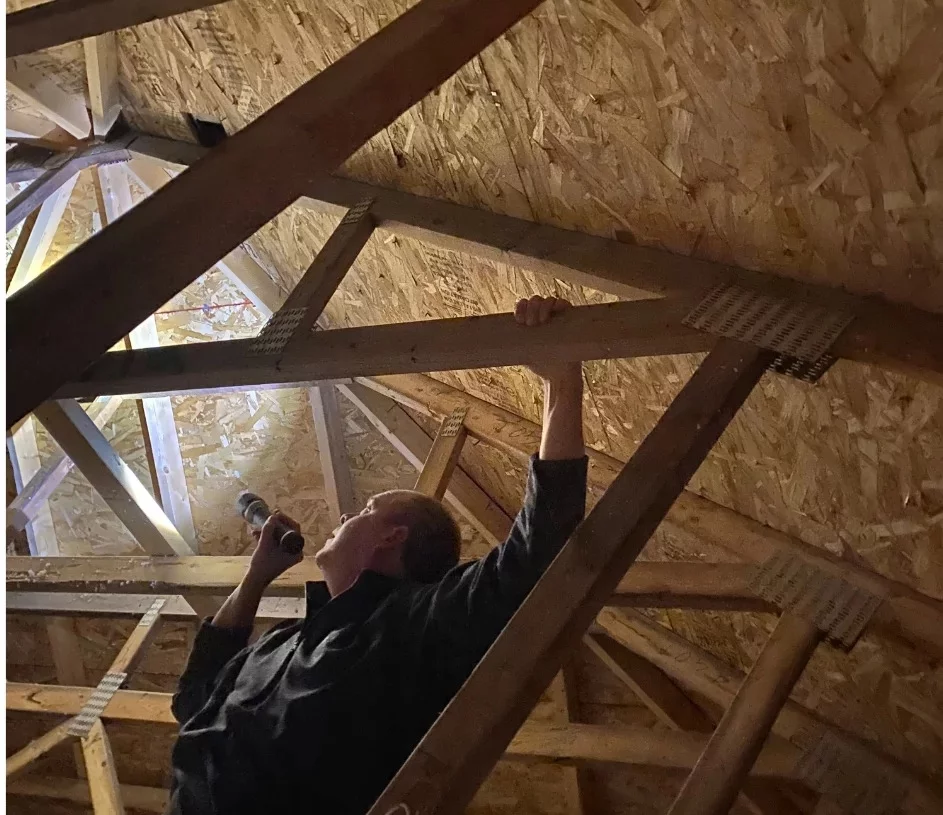 home inspector - inspecting attic property in ontario